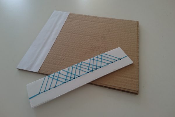 Both the cover and binding mockups